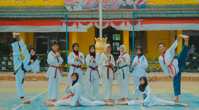 View of Taal Volcano surrounded by lake and green landscape, Batangas, Philippines